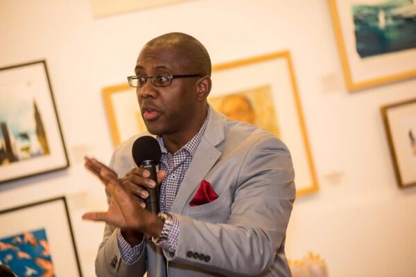 An illustrated image of a large desk calendar with a small steaming cup of coffee in front of it