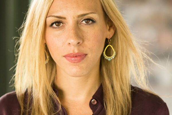 An illustrated image of a large desk calendar with a small steaming cup of coffee in front of it