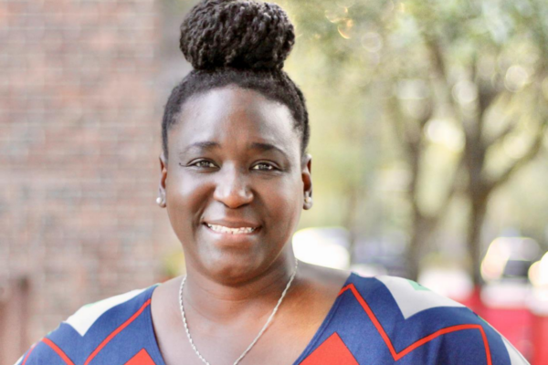 Tembi Gray, founder of GMG Performing Arts Center, smiles for her portrait.