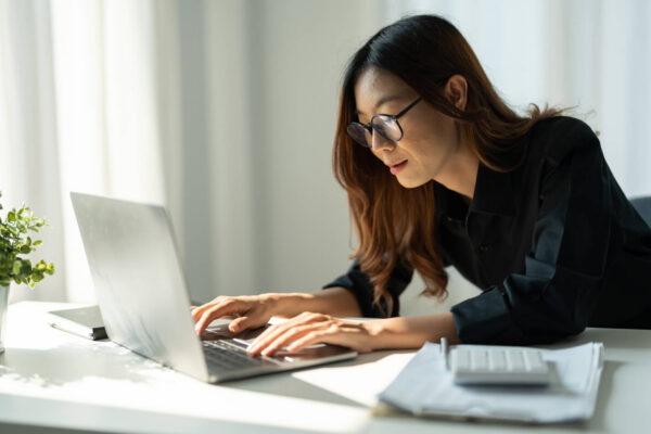 Female business owner on laptop